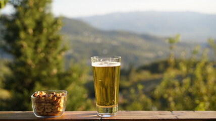 Pint of Beer and Peanuts Outdoors