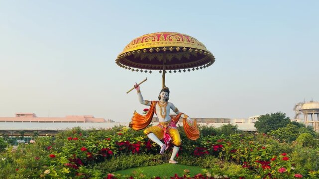 Lord Krishna playing flute under a decorative parasol &mdash; symbolizing protection, music, and divine charm in Hindu mythology.