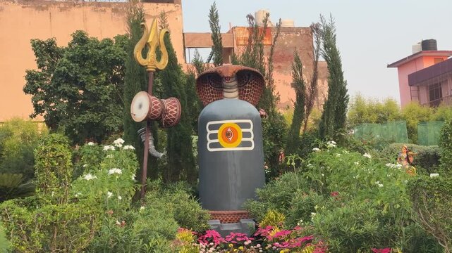 Sacred Shivling and Trishul Symbol of Lord Shiva in Temple Garden