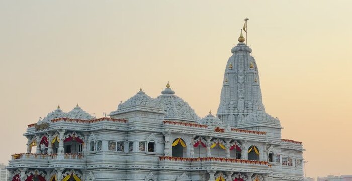 Twin Marble Domes of Prem Mandir Glowing in Sunset Light