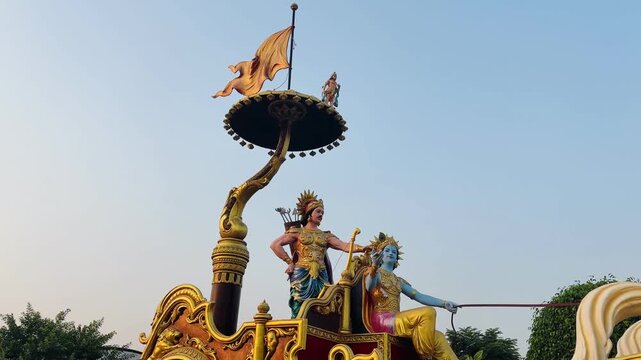 Lord Krishna and warrior Arjuna on a golden chariot, inspired by the Bhagavad Gita scene from the Mahabharata &ndash; Symbol of Guidance and Dharma.