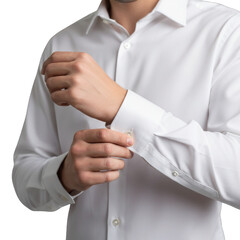 Man in a white shirt fastens cuff links for formal occasion elegant attire presentation