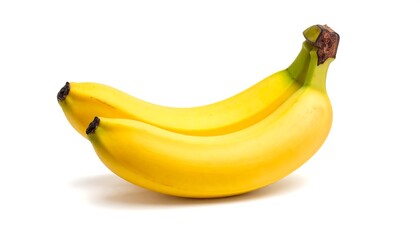 Three ripe bananas in a curved bunch lying on a white surface with soft shadows, contrasting skin and stem hues
