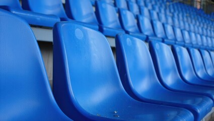 Fototapeta premium Rows of empty blue stadium seats create a vibrant and inviting atmosphere