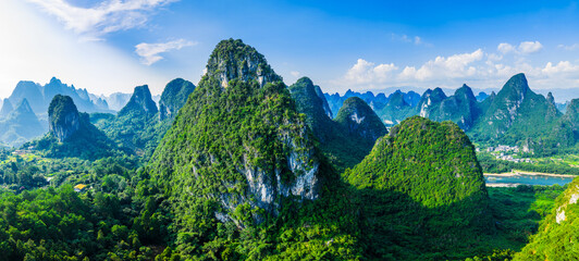 Aerial view of the beautiful green karst mountain and forest natural landscape in Guilin, China.