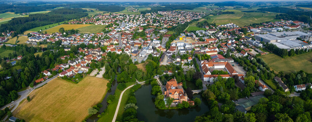 Aerial panoramic view of the city and old town of Taufkirchen, Bavaria in Germany on a sunny day in summer. © Karl