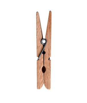 A wooden clothes peg isolated. A cutout clothespin.