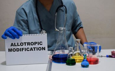 A healthcare professional conducts experiments on allotropic modification in a lab. scientific research concept