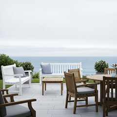 Obraz premium Outdoor furniture overlooks ocean view in coastal setting