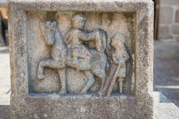 Calvary figure representing Saint Martin sharing his cloak with a beggar