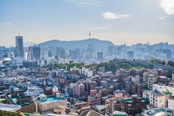 Seoul's Namsan Tower and its surrounding cityscape during the autumn day