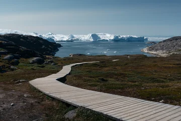 Gardinen Gletscher A stunning and surreal landscape unfolds in Greenland's UNESCO World Heritage Ilulissat Icefjord. Massive icebergs, freshly calved from the Sermeq Kujalleq glacier  © Marek
