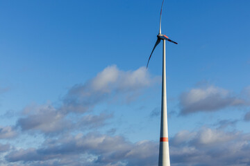 Wind Turbine Under Blue Sky