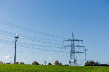 Obraz premium Wind Turbine Under Blue Sky
