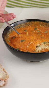 pumpkin crem soup with seeds and cheese mix by spoon food