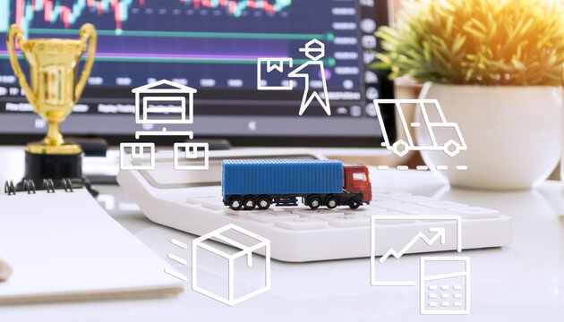 Miniature truck on calculator with digital logistics icons and stock market chart, symbolizing supply chain strategy, delivery, and performance tracking.