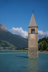 Church tower of Altgraun submerged in Lake Resia