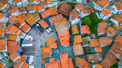 Obraz premium Cudillero Rooftops at Dusk aerial view