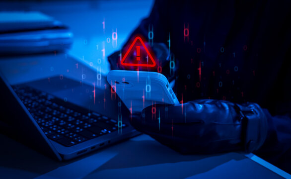 Cybercriminal with black gloves using smartphone with warning alert icon. Hacker activity, scammer fraud, phishing attack, data breach, identity theft, and cybersecurity threat in digital era. - Powered by Adobe