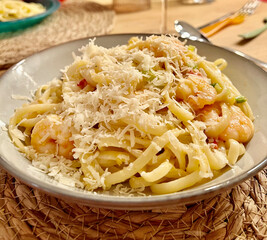Creamy Seafood Linguine Topped with Grated Parmesan Cheese