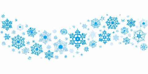 Abstract pattern of blue snowflakes scattered across a white background
