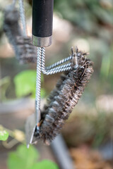 Grill brush with blurred background