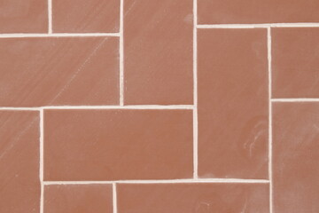 Piso retangular vermelho de área de casa brasileira, chão com revestimento vintage