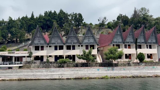 Hotel with traditional Toba lake roofs at Parapat, Toba Lake Sumatra Indonesia