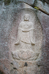 Fototapeta premium Rock Carved Buddha Relief in South Korea