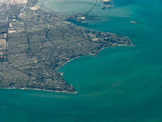 aerial landscape view of coastline around Kuwait City with skyline and skyscraper, Marina Beach, Green Island, Ras Al Ard Marina and parts of Sheikh Jaber Al-Ahmad Al-Sabah Causeway across Kuwait Bay