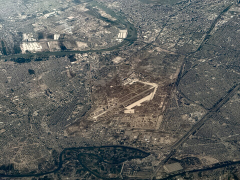aerial landscape view of area around southeastern outskirts of Baghdad, in Diyala Governorate of Iraq with Baghdad suburbs,  Tigris river and Al Rasheed Air Base