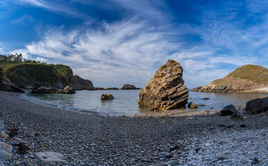 Pormenade beach seascape with a blue sky.  Panoramic view. Viavelez. Asturias. Spain