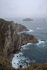 Lighthouse of Peña seascape on a rainy day. Gozón. Asturias. Spain