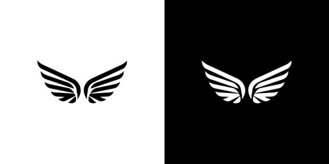 Fototapeta premium Black and white wing icons on split color