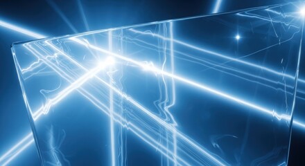 Obraz premium Shimmering blue light beams reflecting through angular glass surfaces creating a futuristic, luminous effect.