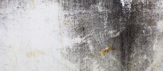 Contrast of white wall and heavy black grunge texture