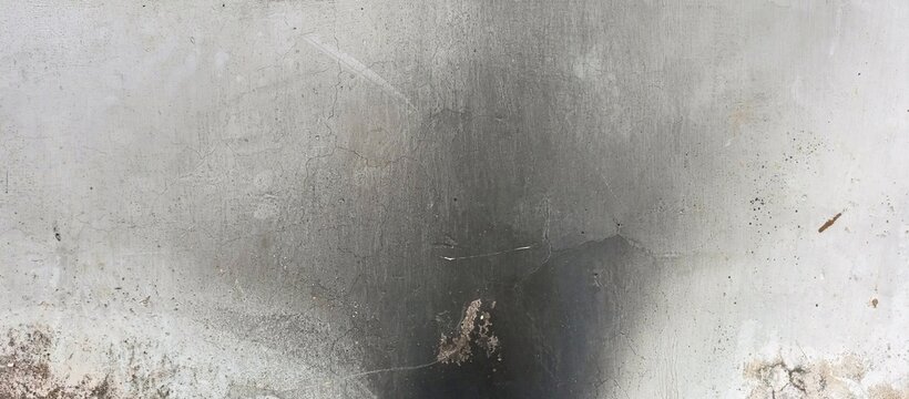 Dark Smoke Stain on Old Gray Concrete Wall