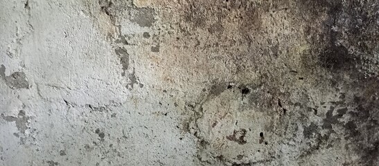 Heavily weathered wall with peeling paint and severe grunge texture