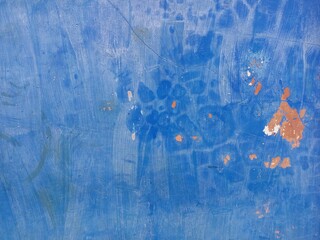 Vertical Brushstrokes on Bright Blue Grunge Wall Texture