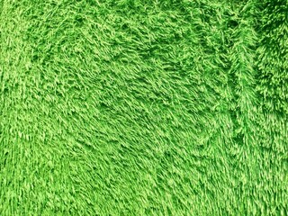 Vibrant bright green shaggy soft texture seamless background