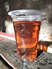 Golden Hour Tea with Soft Sunlight Reflection