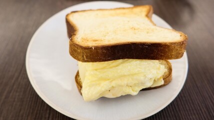 close up of a korean homemade breakfast scrambled egg toast bread with copyspace