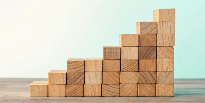 Wooden block stack growth step stair chart wooden cube business success