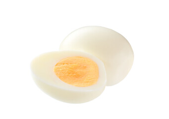 Hard boiled chicken eggs and half of egg with yellow yolk  isolated on a white background.