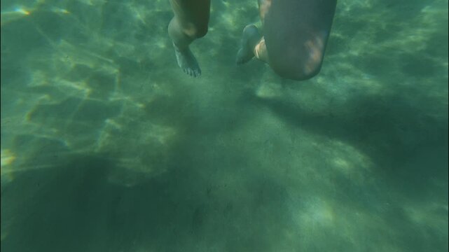 Diving Under Ocean caustics sunlight diving