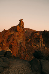 Warm sunset glow panorama over Tenerife's volcanic terrain, excellent for travel blogs, nature photography, and stock photo markets