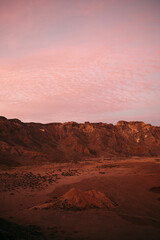 Warm sunset glow panorama over Tenerife's volcanic terrain, excellent for travel blogs, nature photography, and stock photo markets