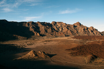 Warm sunset glow panorama over Tenerife's volcanic terrain, excellent for travel blogs, nature photography, and stock photo markets