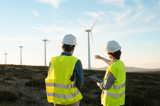 Engineers Inspecting Wind Turbine on a Sunny Day &ndash; Spain