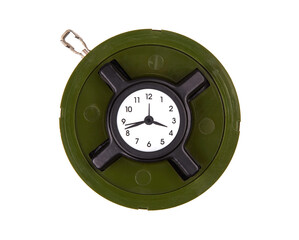A green circular object resembling a landmine features a clock face at its center, isolated on a white back